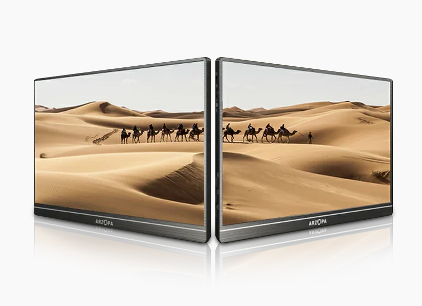Monitores Arzopa S1 espelhados mostrando uma cena no deserto